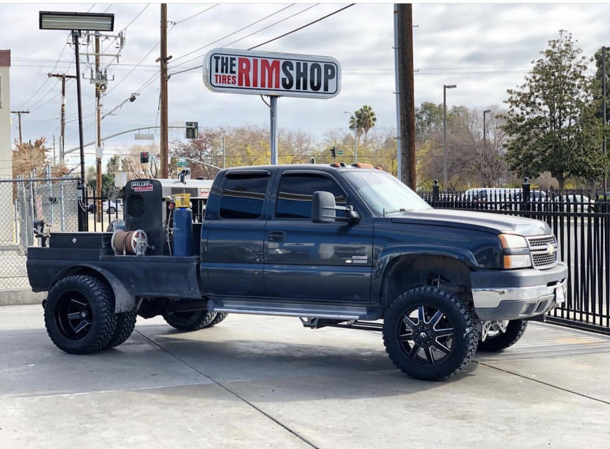 Chevy 3500 truck with custom wheels